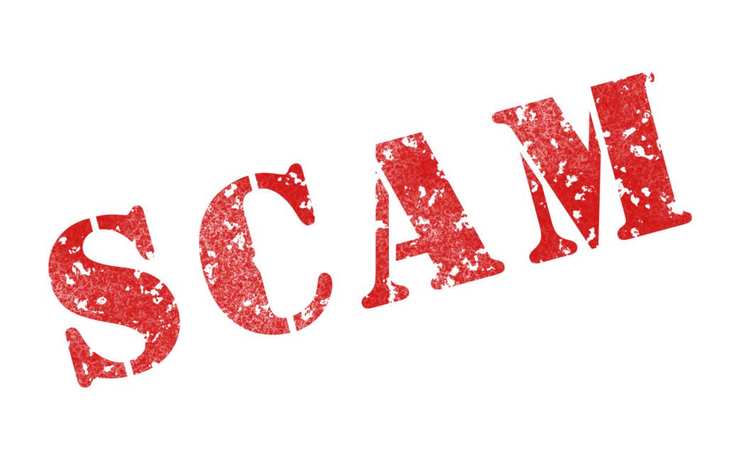 The word scam in large red letters